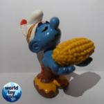 20197 - Indian Smurf with ear of corn